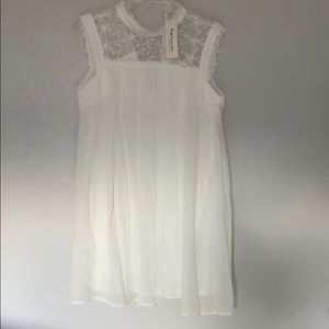 White mid thigh length dress